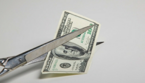$100 bill cut in half with scissors
