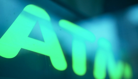 Green ATM sign