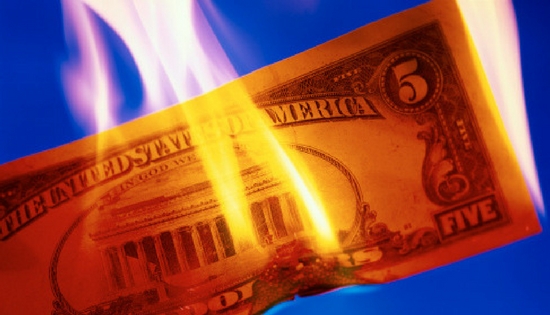 five dollar bill on fire